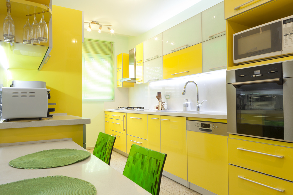 Modern design kitchen with yellow and green elements