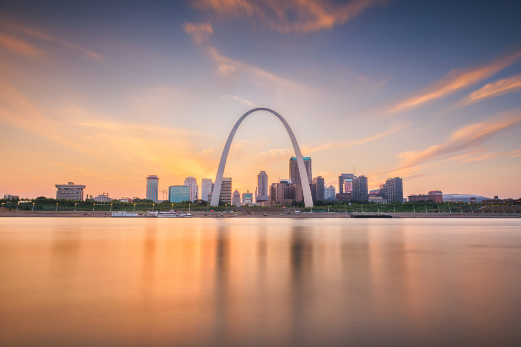 St. Louis, Missouri, USA downtown cityscape on the Mississippi River at twilight.