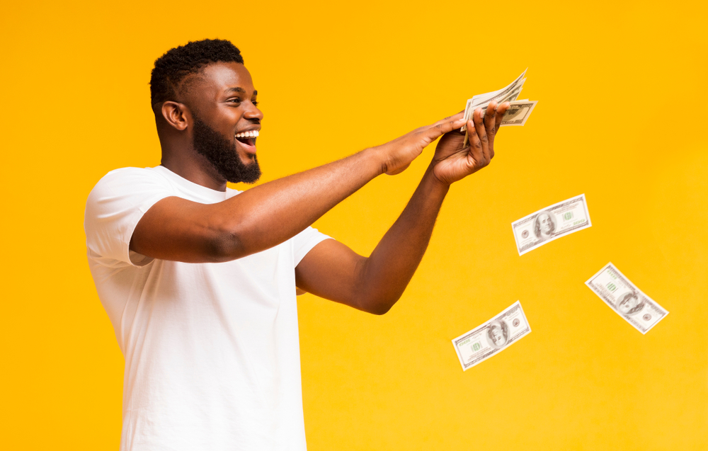 Young Man Excited Tossing Money Home Equity 